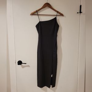 Tight-fitting asymmetrical spaghetti strap dress with slit